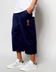 Широкие укороченные спортивные штаны adidas Originals Budo AZ6368