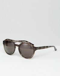 Солнцезащитные очки в круглой черепаховой оправе Calvin Klein Sun