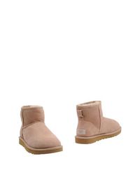 Бежевые Полусапоги и высокие ботинки UGG Australia