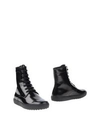 Полусапоги и высокие ботинки Tod's