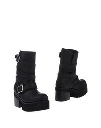 Черные Полусапоги и высокие ботинки Jeffrey Campbell