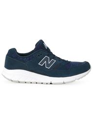 кроссовки с логотипами по бокам New Balance