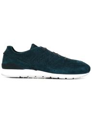 кроссовки с перфорированным логотипом по бокам New Balance