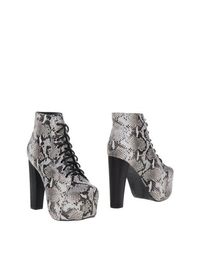 Черные Полусапоги и высокие ботинки Jeffrey Campbell