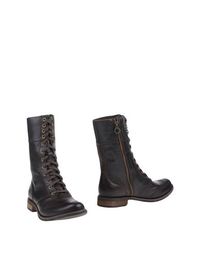 Коричневые Полусапоги и высокие ботинки Timberland
