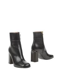 Коричневые Полусапоги и высокие ботинки Marni