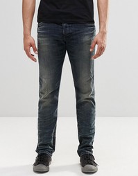 Темные винтажные джинсы слим с потертостями Diesel Belther 854S