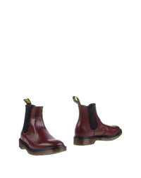 Полусапоги и высокие ботинки DR. Martens