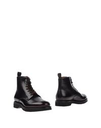 Полусапоги и высокие ботинки Santoni