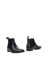 Полусапоги и высокие ботинки Santoni