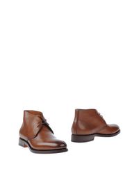 Полусапоги и высокие ботинки Santoni