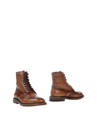 Полусапоги и высокие ботинки Santoni