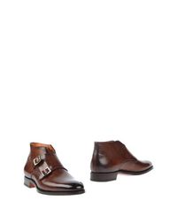 Полусапоги и высокие ботинки Santoni