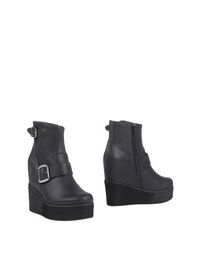 Черные Полусапоги и высокие ботинки Jeffrey Campbell