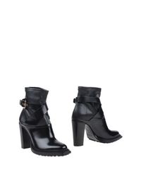 Черные Полусапоги и высокие ботинки Pollini