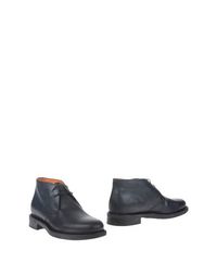 Полусапоги и высокие ботинки Santoni