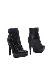 Черные Полусапоги и высокие ботинки Stuart Weitzman