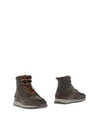 Полусапоги и высокие ботинки Santoni