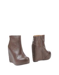 Зеленые Полусапоги и высокие ботинки Jeffrey Campbell