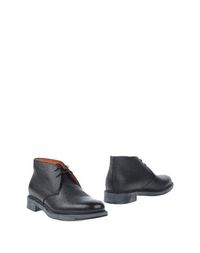 Полусапоги и высокие ботинки Santoni