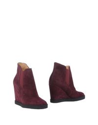 Полусапоги и высокие ботинки Santoni
