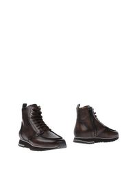 Полусапоги и высокие ботинки Santoni
