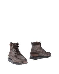 Полусапоги и высокие ботинки Santoni