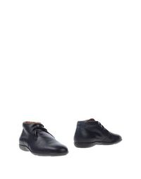 Полусапоги и высокие ботинки Santoni