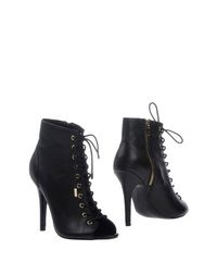Черные Полусапоги и высокие ботинки Steve Madden
