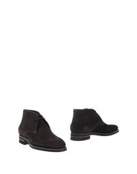 Полусапоги и высокие ботинки Santoni