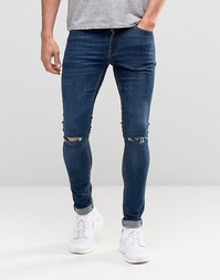 Темные супероблегающие джинсы с рваными коленями ASOS - Темный синий