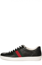 Кожаные кеды с тиснением Gucci