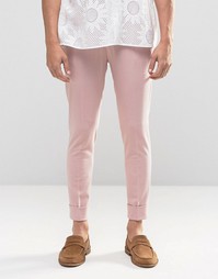 Розовые трикотажные суперзауженные брюки с отворотами ASOS - Розовый