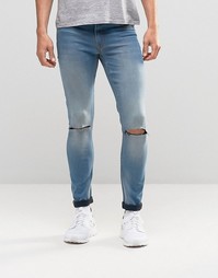 Выбеленные джинсы с покрытием и рваными коленями ASOS