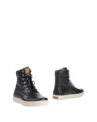 Полусапоги и высокие ботинки Timberland