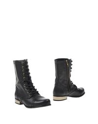 Черные Полусапоги и высокие ботинки Steve Madden