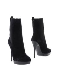 Черные Полусапоги и высокие ботинки Yves Saint Laurent
