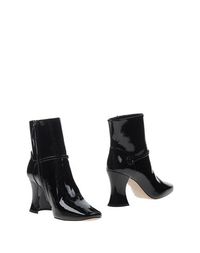 Черные Полусапоги и высокие ботинки MIU MIU