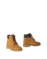 Полусапоги и высокие ботинки Timberland