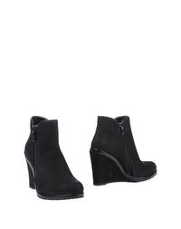 Черные Полусапоги и высокие ботинки Vince Camuto
