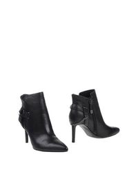 Черные Полусапоги и высокие ботинки Guess