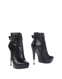 Черные Полусапоги и высокие ботинки Guess