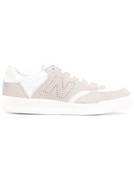 кроссовки с перфорированным логотипом по бокам New Balance