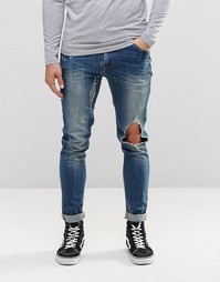 Супероблегающие синие джинсы с прорехами ASOS - Умеренный синий