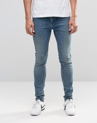 Синие зауженные джинсы в винтажном стиле ASOS - Умеренный синий