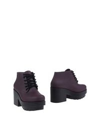Полусапоги и высокие ботинки Melissa