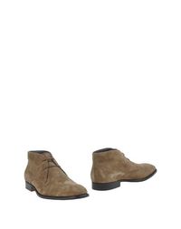 Полусапоги и высокие ботинки Tods