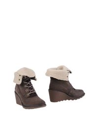 Коричневые Полусапоги и высокие ботинки Timberland
