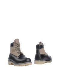 Полусапоги и высокие ботинки Timberland