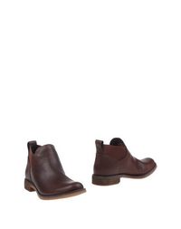 Коричневые Полусапоги и высокие ботинки Timberland